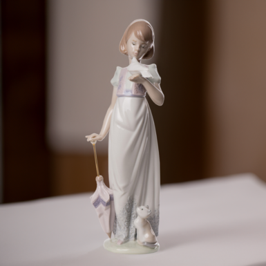 Фарфоровая статуэтка "Приятная прогулка" от Lladro