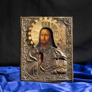 Antique icon "Savior" in a brass setting of the last quarter of the 19th century