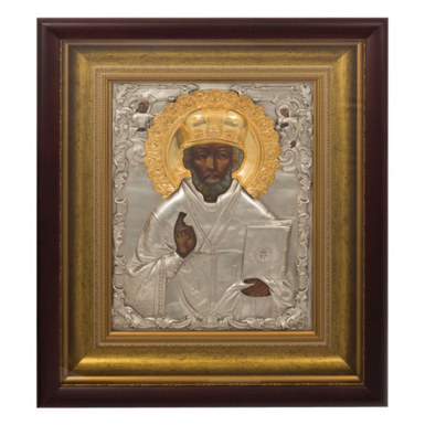 Icon of Nicholas the Wonderworker with silver plating in a wooden frame