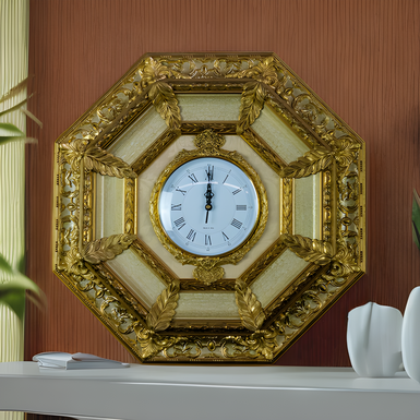 Настінний годинник в золотій оправі від Arte Casa