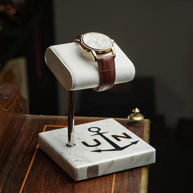"Ulysse Nardin" watch stand with marble base by Michel Maloch