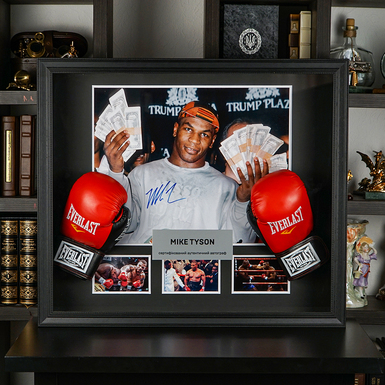 Certified autograph of boxer Mike Tyson on a photo in a collage with pictures and boxing gloves (77x65 cm)