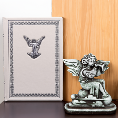 Set of a diary with a Guardian Angel and a polymer figurine “An angel in Hutsul clothes plays the pipe” from Vyacheslav Didkovsky