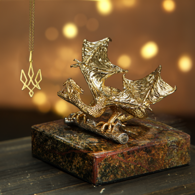 Комплект із латунної статуетки "Фантастичний дракон" із позолотою та срібної підвіски (925 проби) з позолотою "Тризуб" 
