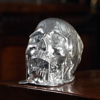 Handmade figurine in the form of a melting skull