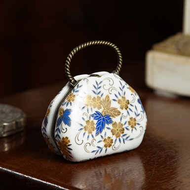 Porcelain figurine "Handbag". Europe, mid-20th century