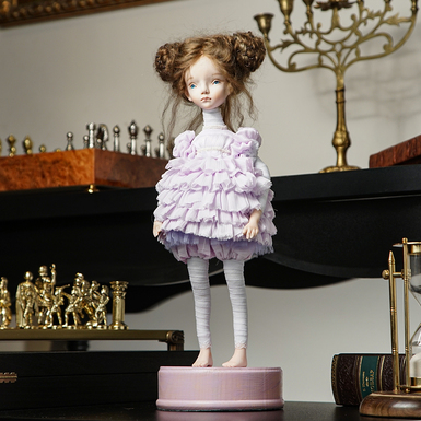 Author's interior handmade doll in purple