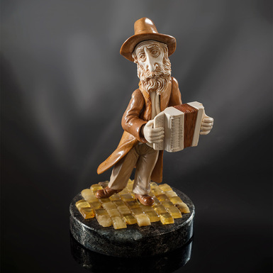 Figurine "Accordion player Josip" (tusk, mammoth, amber, pyrotin) by Lobortas