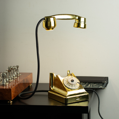 Table lamp "Golden phone" made of plastic and sheet metal with touch switch