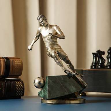 Dynamic bronze sculpture "Footballer" (silver, serpentine stone) by Lobortas