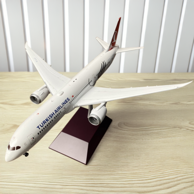 Scale model of the Boeing B787-9 Dreamliner Turkish Airlines aircraft made of metal on a stand