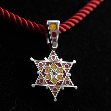 Magen David pendant in 950 sterling silver and enamel (in red) from Lobortas