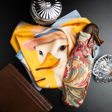 A gift set of a colored folding umbrella with a duck handle by Pasotti and a scarf made of natural silk "Swanny" by FAMA (limited collection, 65x65 cm)