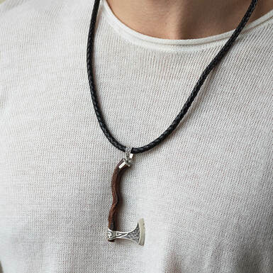 Silver pendant "Axe" with a tree by the Fama Jewelry House