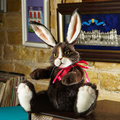 Author's artificial fur toy "Bunny with a red ribbon"