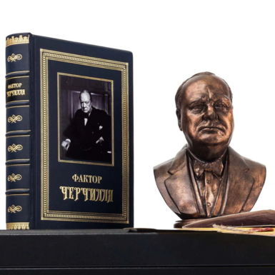 The book "The Churchill Factor" and a bust of Winston Churchill