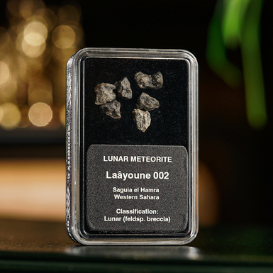 Certified lunar meteorite "Laâyoune 002 LANS 0036", 1.03 g (Western Sahara)