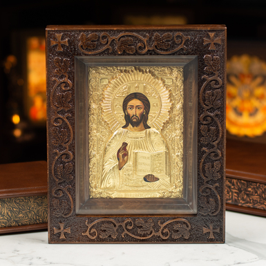 Icon Savior with carved frame made of copper and silver plating