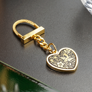 Брелок "Heart" от бренда Anframa из дамасской стали и позолотой