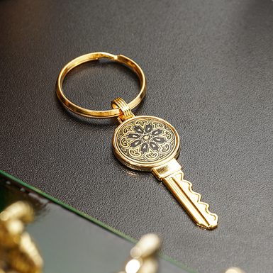 Брелок "Heart" от бренда Anframa из дамасской стали и позолотой