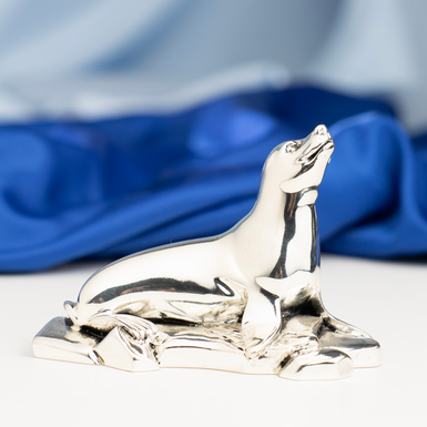 Silver-plated seal on a rock figurine by Exetera Argenti