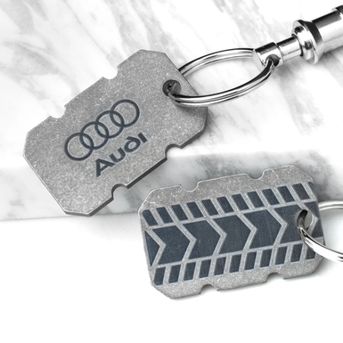 Титановый брелок "Audi" со швейцарским карабином "Victorinox" от Calti