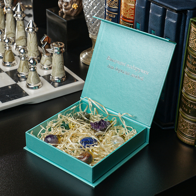 A collectible set of Christmas tree decorations made from semi-precious minerals, "Magic of Light," from Stone Art Designe