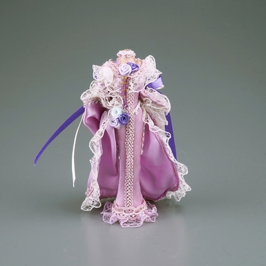 Porcelain mannequin in a dress by Reutter Miniaturen