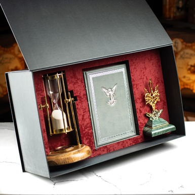 Gift set: leather diary with a silver Guardian Angel insert, a vintage hourglass "Royal Compass - 1953," a designer figurine of the Coat of Arms of Ukraine Trident, and a gift box