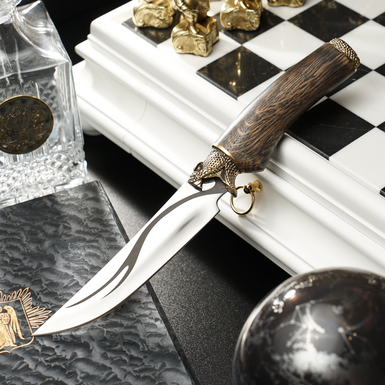 Knife with engraving "Wooden Snake" in a leather case from GRAND