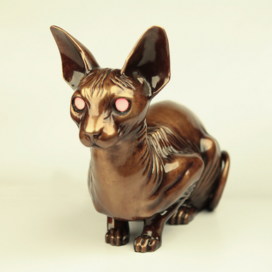 Bronze statuette "Cat Spirit" with glowing eyes