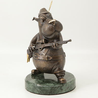 Brązowa statuetka "Golden trophy hunter" ze złoceniem