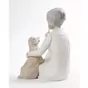 as a gift figurine of a boy with a dog