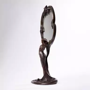 зеркало с изображением  женской фигуры
