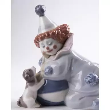 original figurine of a clown with a puppy and a ball