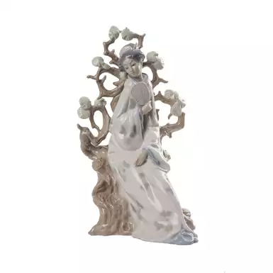 original porcelain figurine of a geisha
