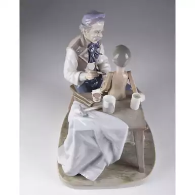 exclusive porcelain figurine of a puppet artist