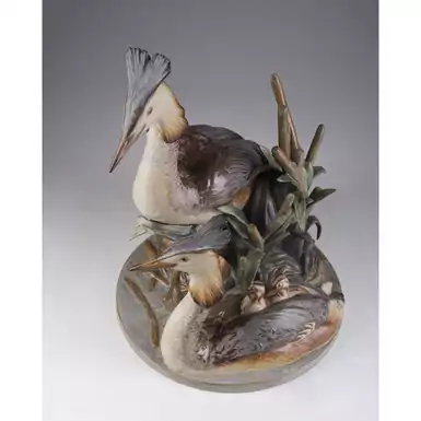 rare porcelain figurine of a bird couple