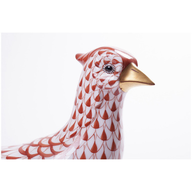 buy a figurine of a pheasant from porcelain in a gift shop