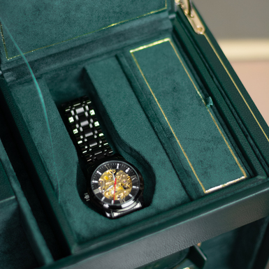 A box for a watch with compartments