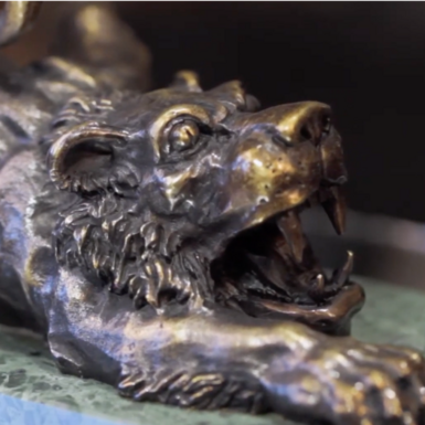 wow video Bronze statuette "Crouching lion"