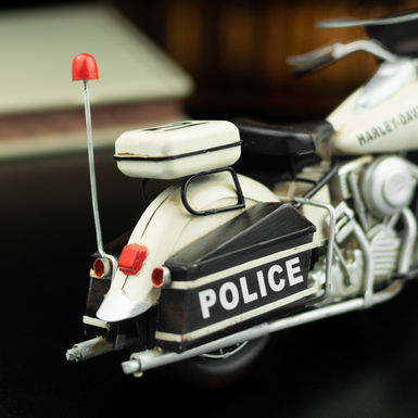 Metal model of a police motorcycle photo