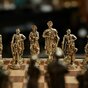 trident figure and chess photo