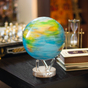 Self-rotating globe photo