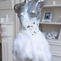 Plastic figurine "White Swan" in the room