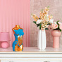 Decorative art lamp "Berehynya" on a pink background horizontal photo close-up view