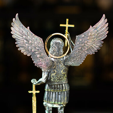 figurine on a pedestal photo