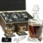 glasses and a decanter for whiskey in a photo case