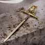 souvenir sword with hand gilding photo