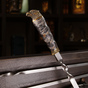 ручка шампура украшена головой орла фото